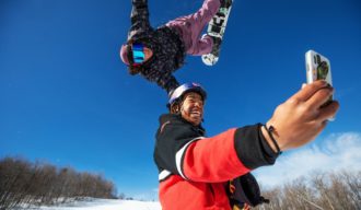 Miles Fallon snowboards with a little help from Zeb Powell at Stratton Mountain, Vermont, USA on 4 March, 2021. // Brian Nevins/Red Bull Content Pool // SI202103050840 // Usage for editorial use only //